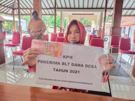 PENYALURAN BANTUAN LANGSUNG TUNAI